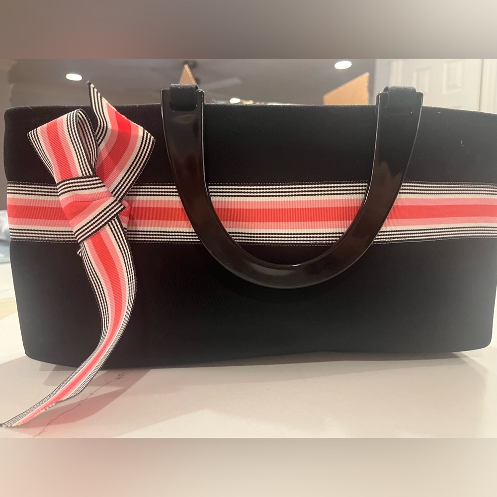 Super fun bag. Hand made great quality!